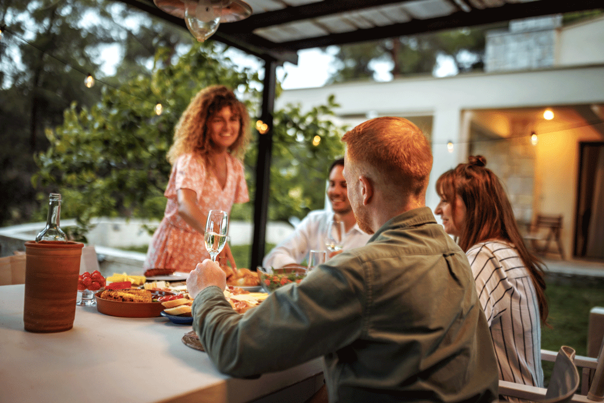 Photo of outdoor dinner party