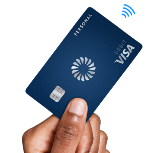 Image of hand holding up debit card